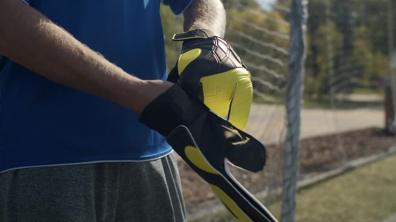 Stock Video Goalkeeper Putting On His Gloves Live Wallpaper For PC - Free Download