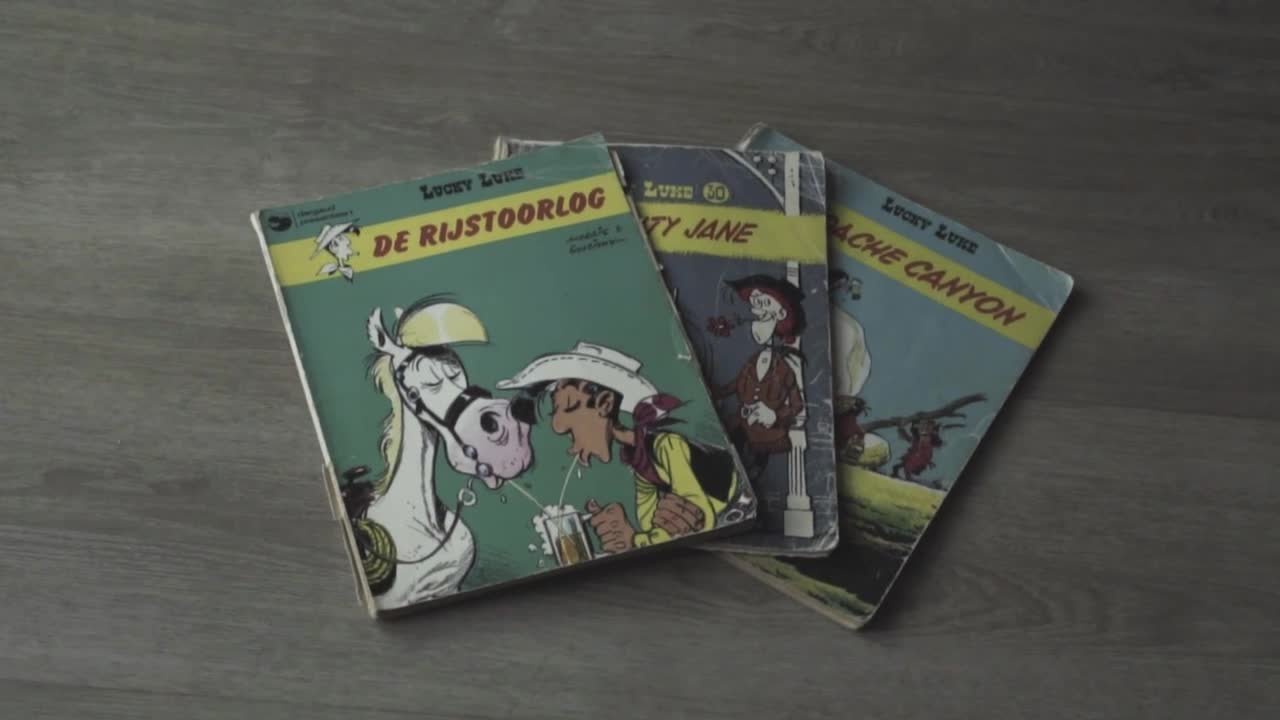 Stock Video Covers Of Three Vintage Lucky Luke Comics Live Wallpaper For PC - Free Download