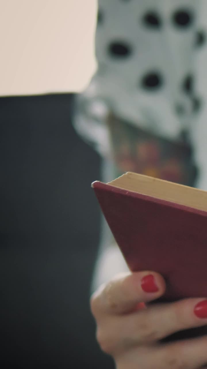 Stock Video Girl Reading A Book In A Shot Close To Her Live Wallpaper For PC - Free Download