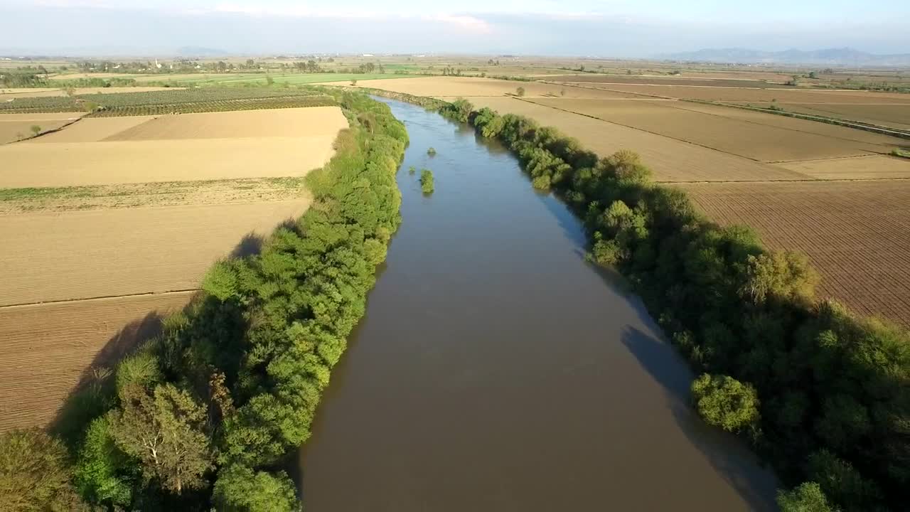 Stock Video Flying Over A River Between Agricultural Fields Live Wallpaper For PC - Free Download
