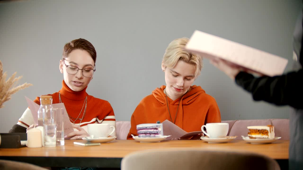 Stock Video Girls Giving The Menu To The Waiter Live Wallpaper For PC - Free Download