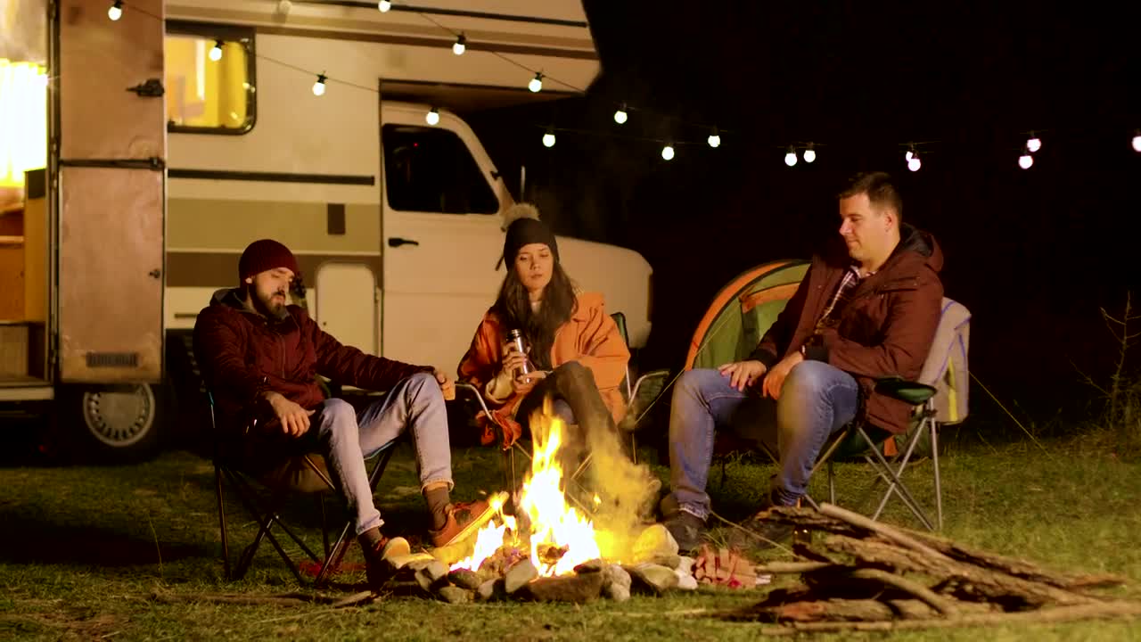 Stock Video Friends Enjoy A Quiet Night Around A Campfire Live Wallpaper For PC - Free Download