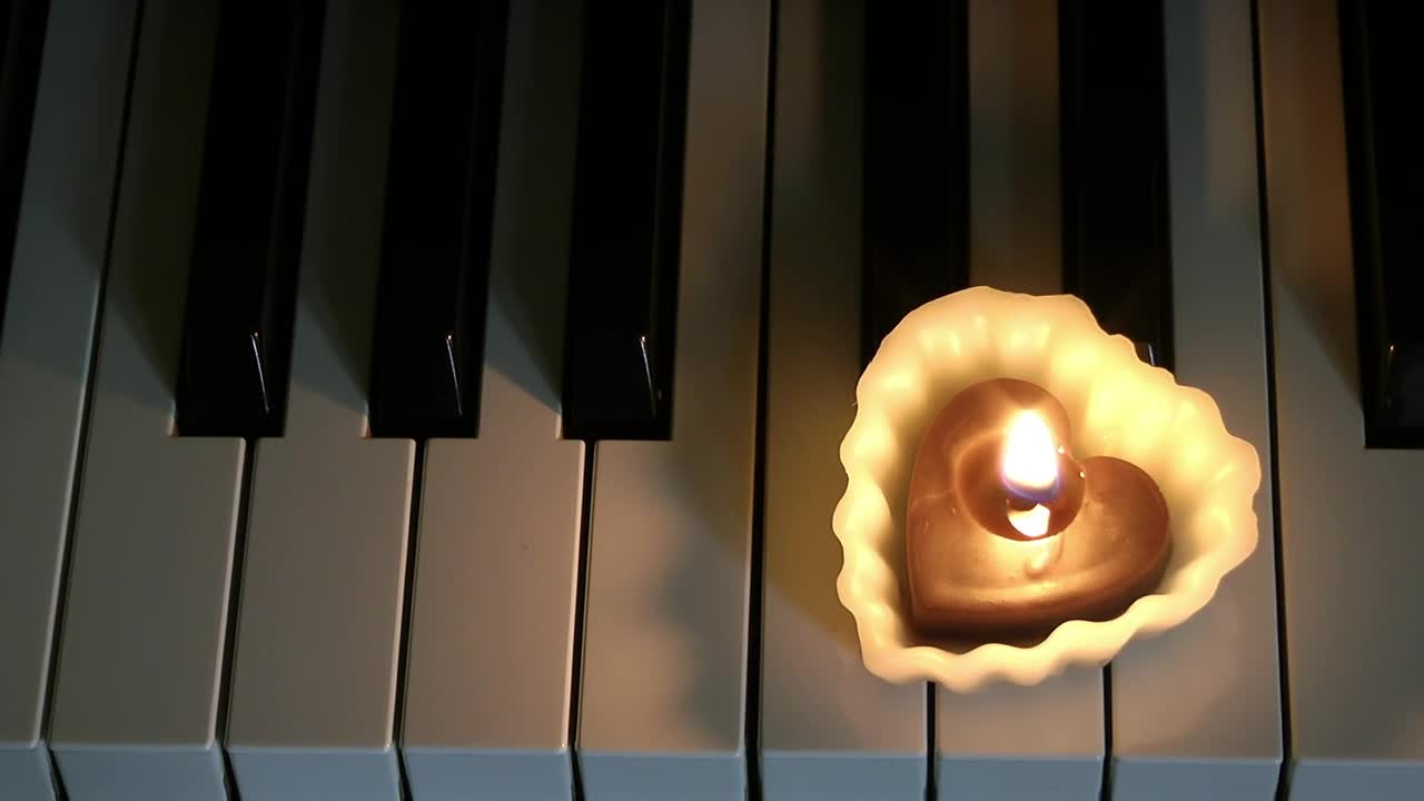 Stock Video Heart Shaped Candle On A Piano Animated Wallpaper - Free Download