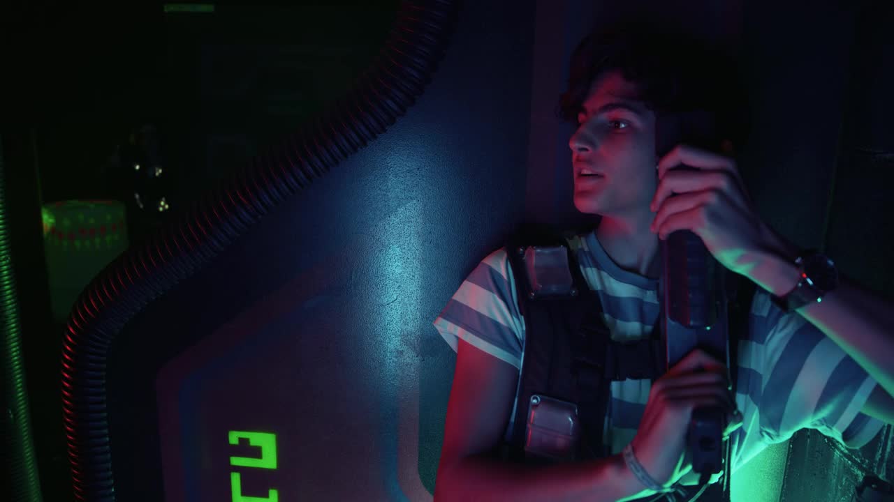 Stock Video Man Hiding In A Laser Tag Battle Animated Wallpaper - Free Download