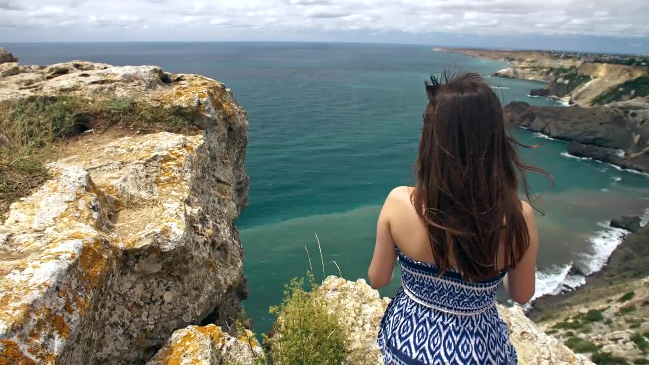 Free Video Stock tourist looking at the beach scenery from above Live Wallpaper - Free Download