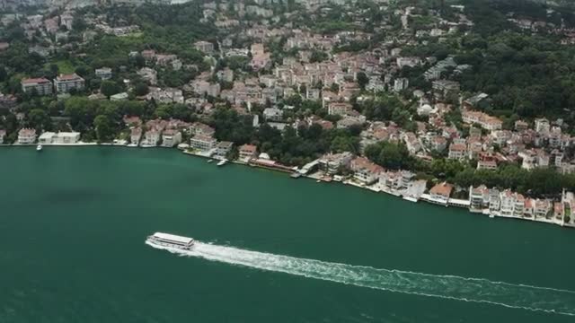 Stock Video Large Boat Heading By The Waterfront Smal Animated Wallpaper - Free Download