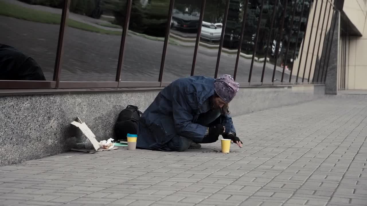 Stock Video Beggar Picking Change From The Street Live Wallpaper For PC - Free Download