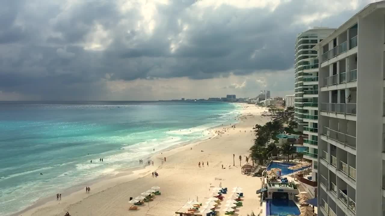 Free Video Stock tourist beach in front of the hotel zone Live Wallpaper - Free Download