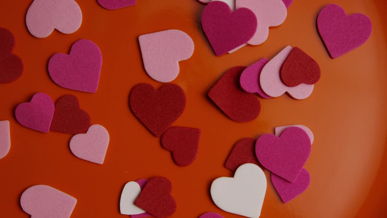 Stock Video Paper Shape Hearts On An Orange Surface Live Wallpaper - Free Download