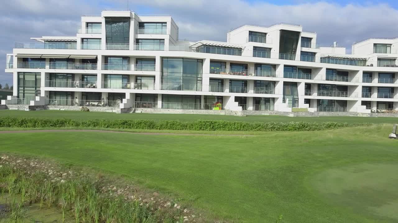 Stock Video Golf Cart Driving By A Hotel Live Wallpaper For PC - Free Download