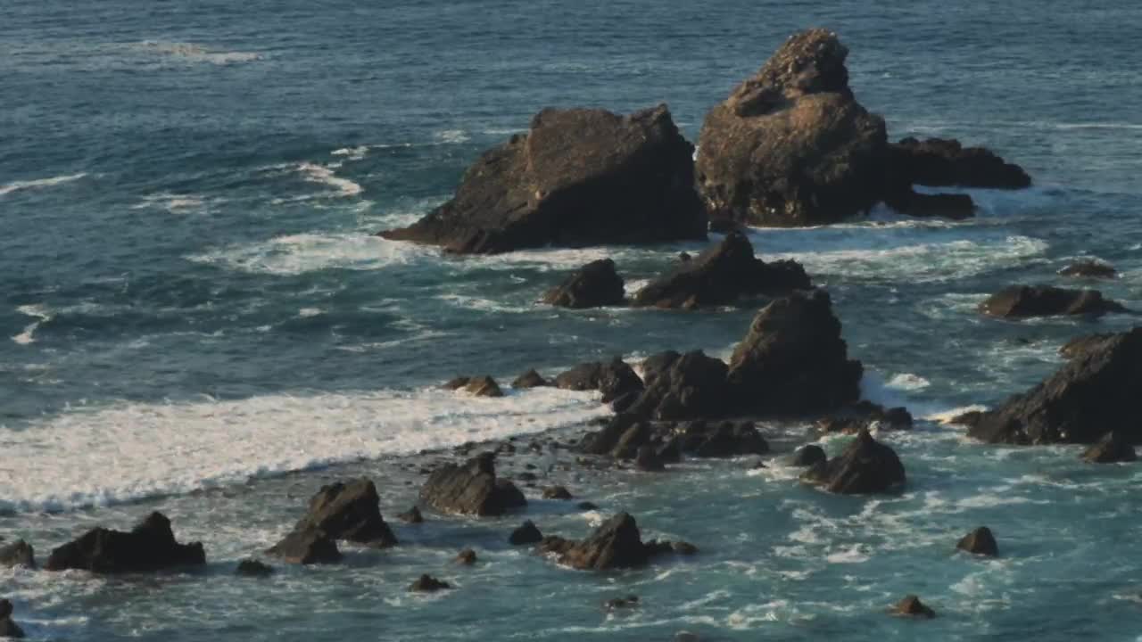 Stock Footage Waves Hitting Rocks On The Beach Live Wallpaper - Free Download