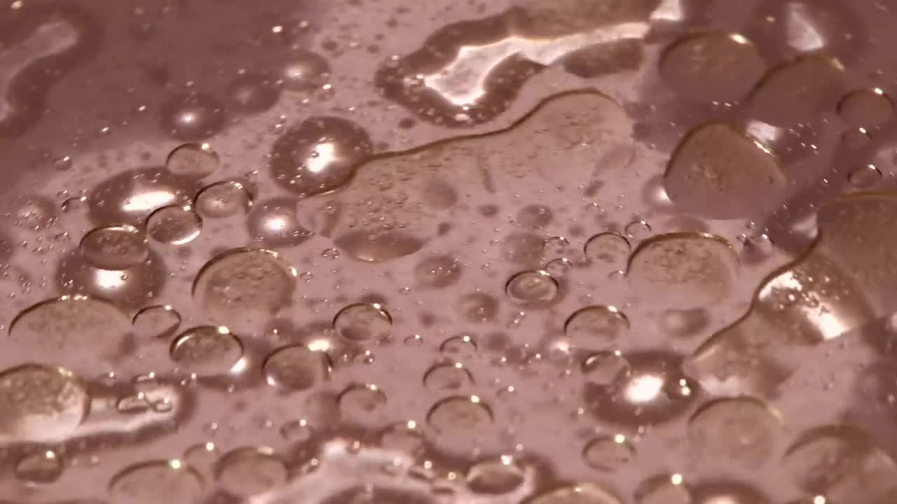 Stock Video Liquid On A Plastic Plate Animated Wallpaper - Free Download