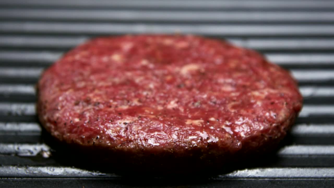 Stock Video Flipping A Hamburger On The Grill Live Wallpaper For PC - Free Download