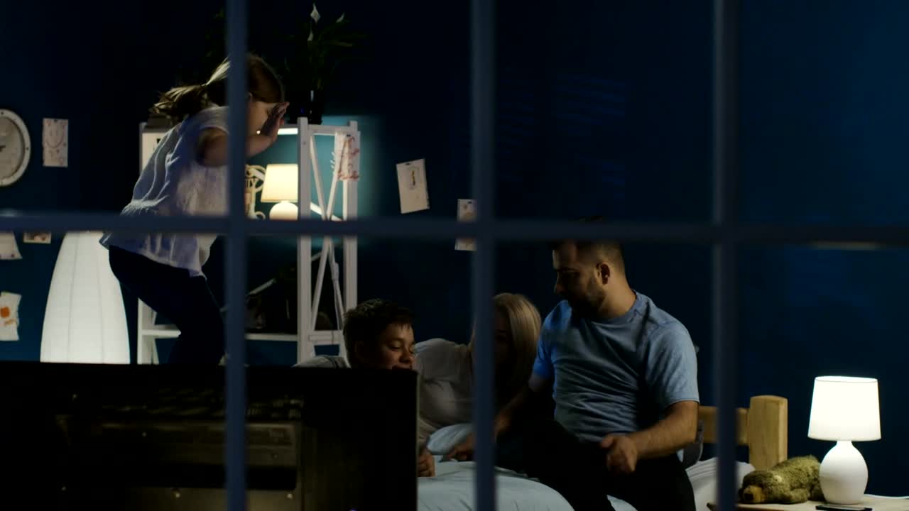 Stock Video Family Prepares To Watch Netflix In The Bedroom Live Wallpaper For PC - Free Download