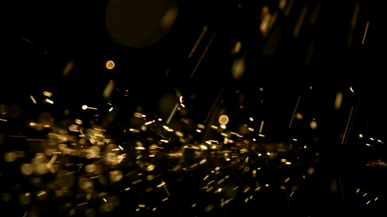 Free Video Stock Sparks Falling Into Black Surface Live Wallpaper - Free Download
