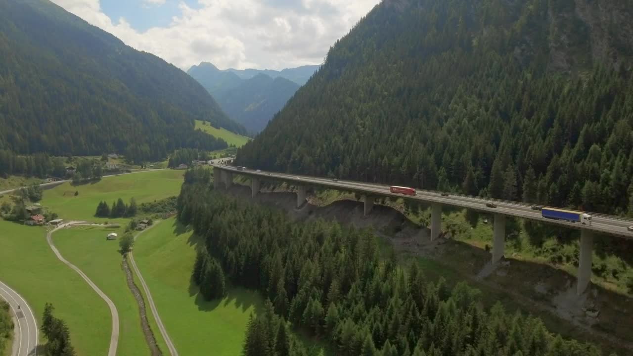 Stock Video Flying Along Mountain Highway In Forested Valley Live Wallpaper For PC - Free Download