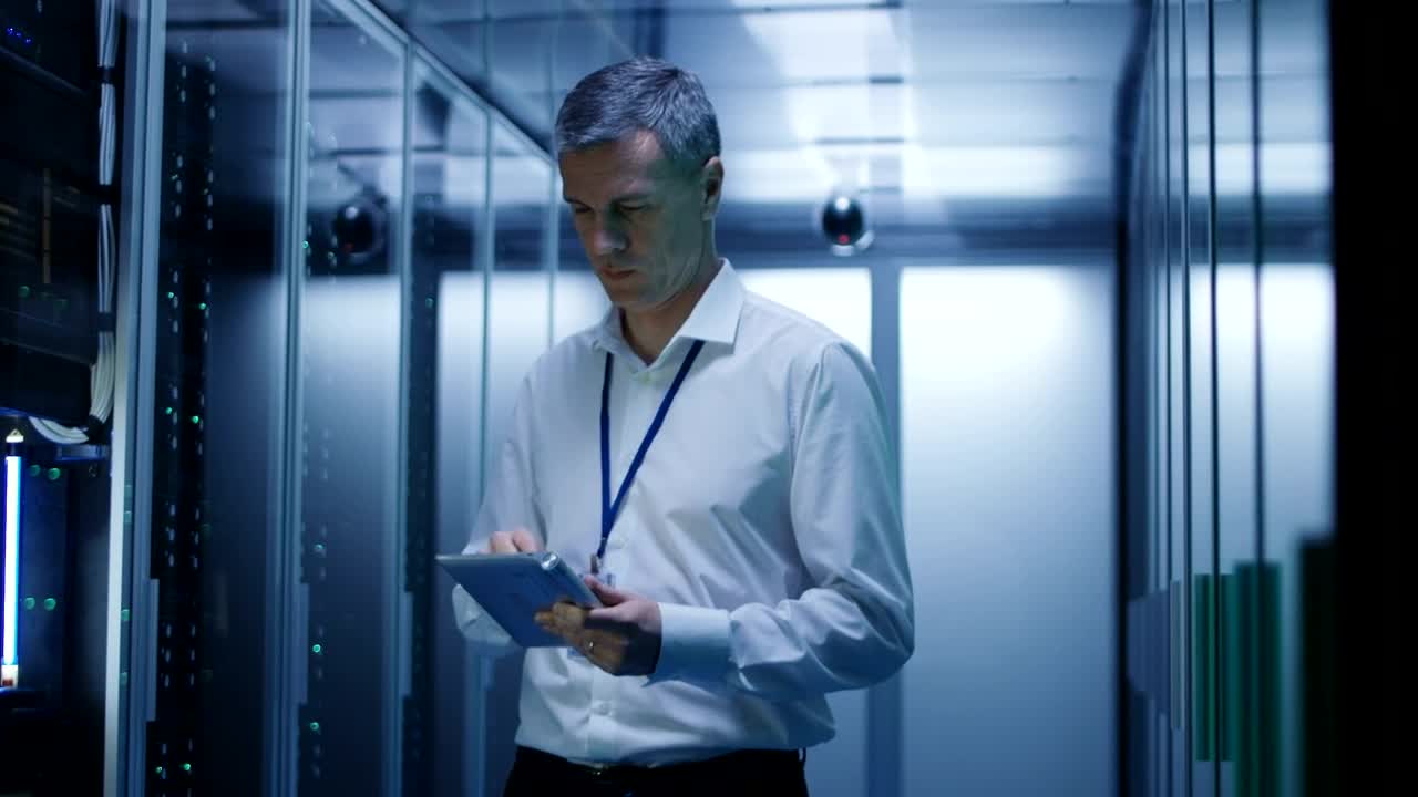 Stock Video Datacenter Engineer With A Tablet Live Wallpaper For PC - Free Download