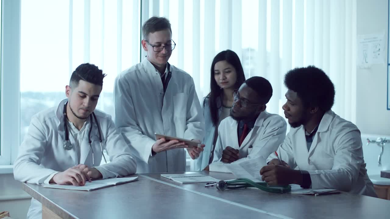 Stock Video Medical Students Sharing Note Animated Wallpaper - Free Download