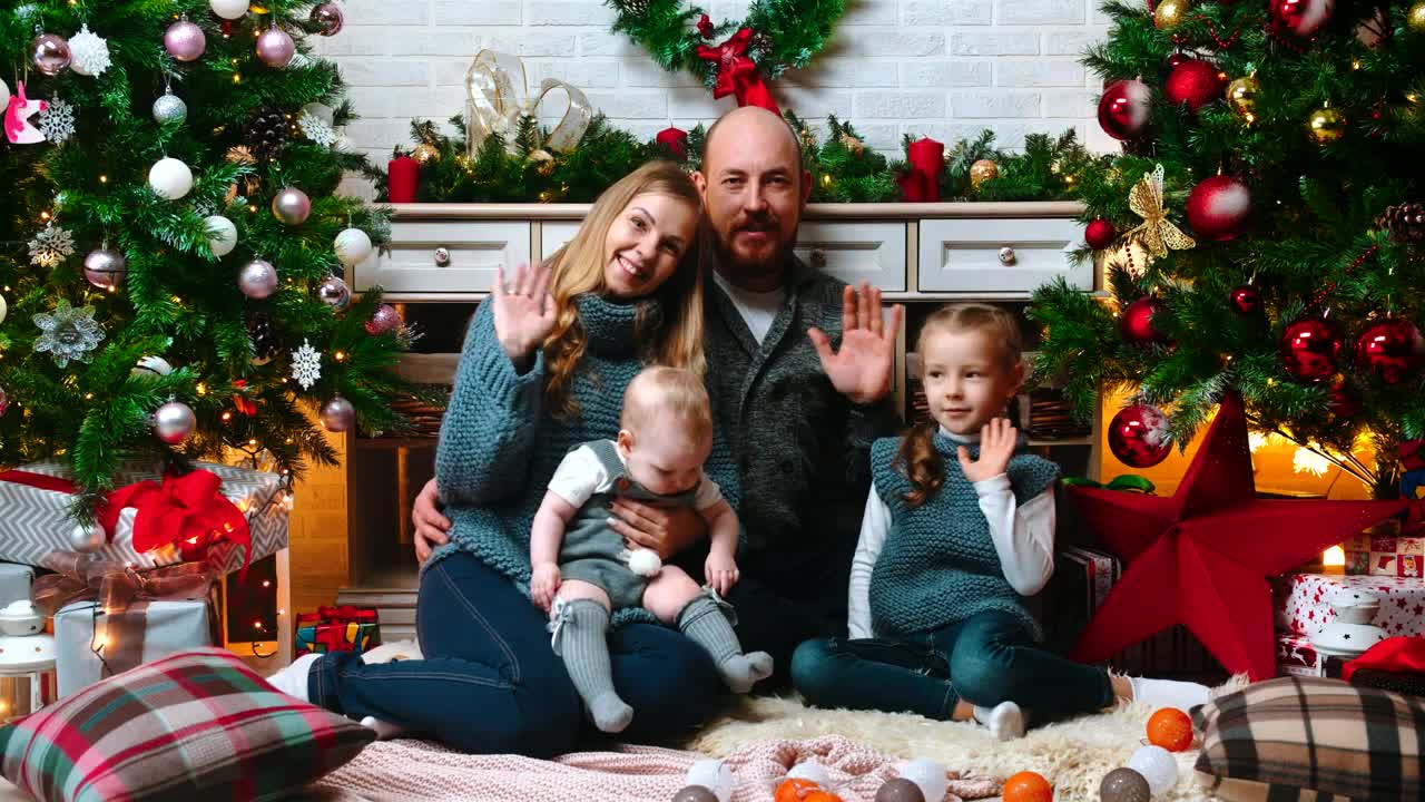 Stock Video Happy Family Greeting At The Camera On Christmas Animated Wallpaper - Free Download