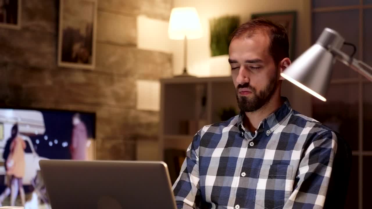 Stock Video Man Thinking While Working On A Lapto Animated Wallpaper - Free Download