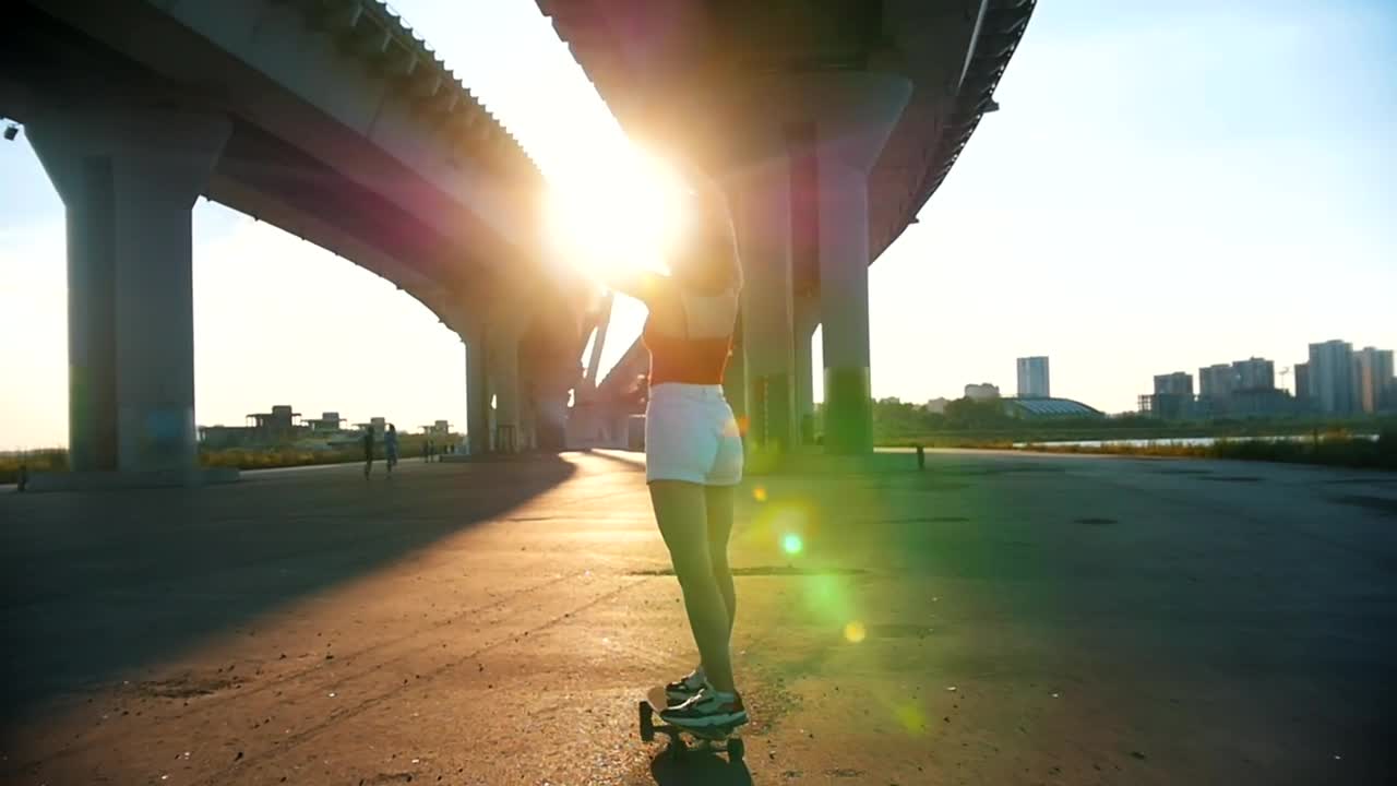 Stock Video Girl Skating In The Afternoon Under A Bridge Live Wallpaper For PC - Free Download