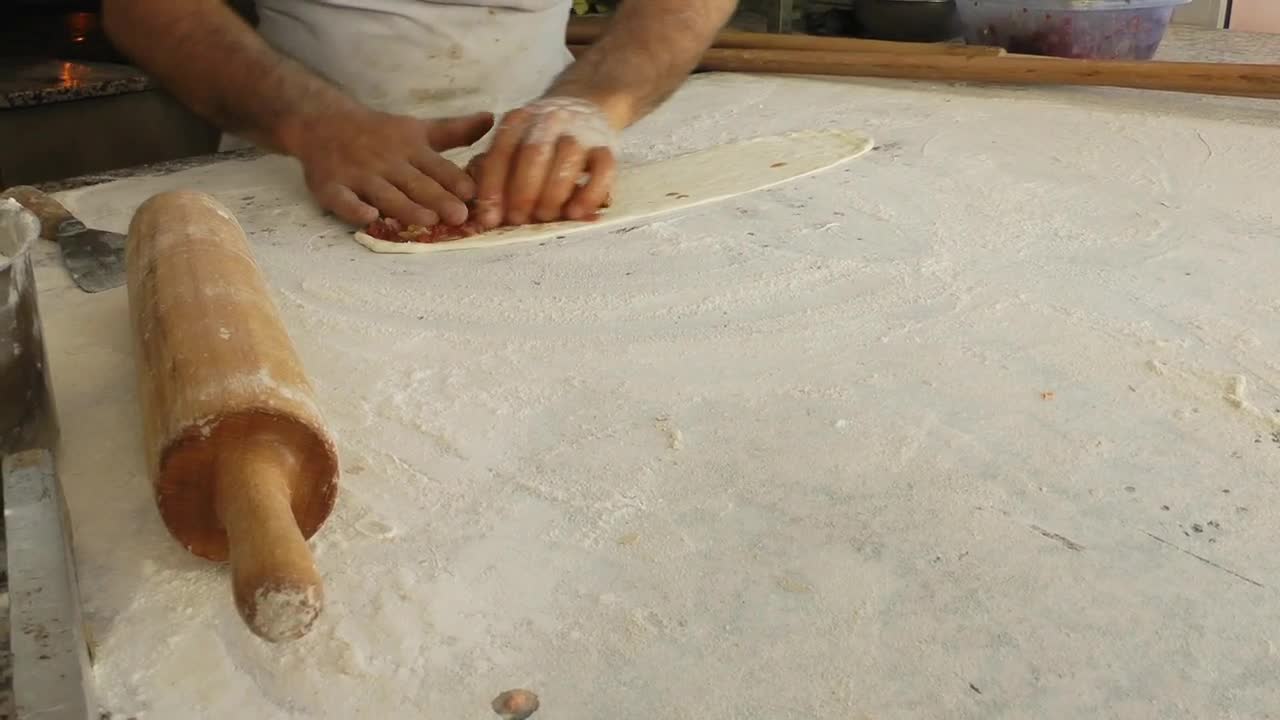 Stock Video Making A Turkey Style Pizza Animated Wallpaper - Free Download