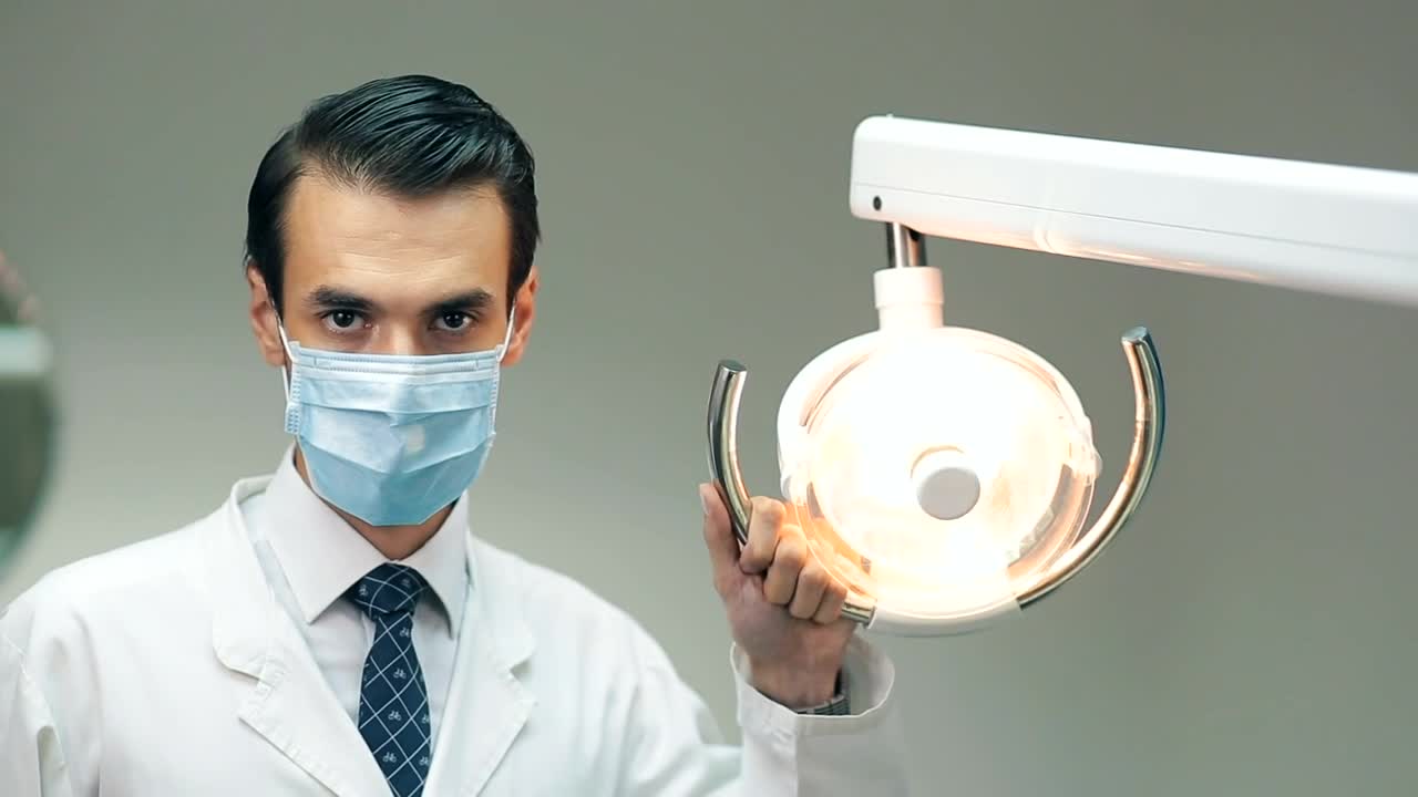 Stock Video Dentist Holding A Lamp In His Office Live Wallpaper For PC - Free Download