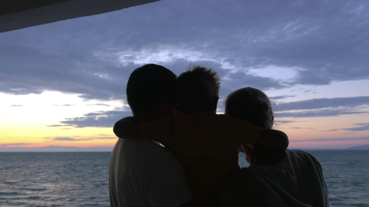 Stock Video Family Looking Out Over The Sea At Dusk Live Wallpaper For PC - Free Download