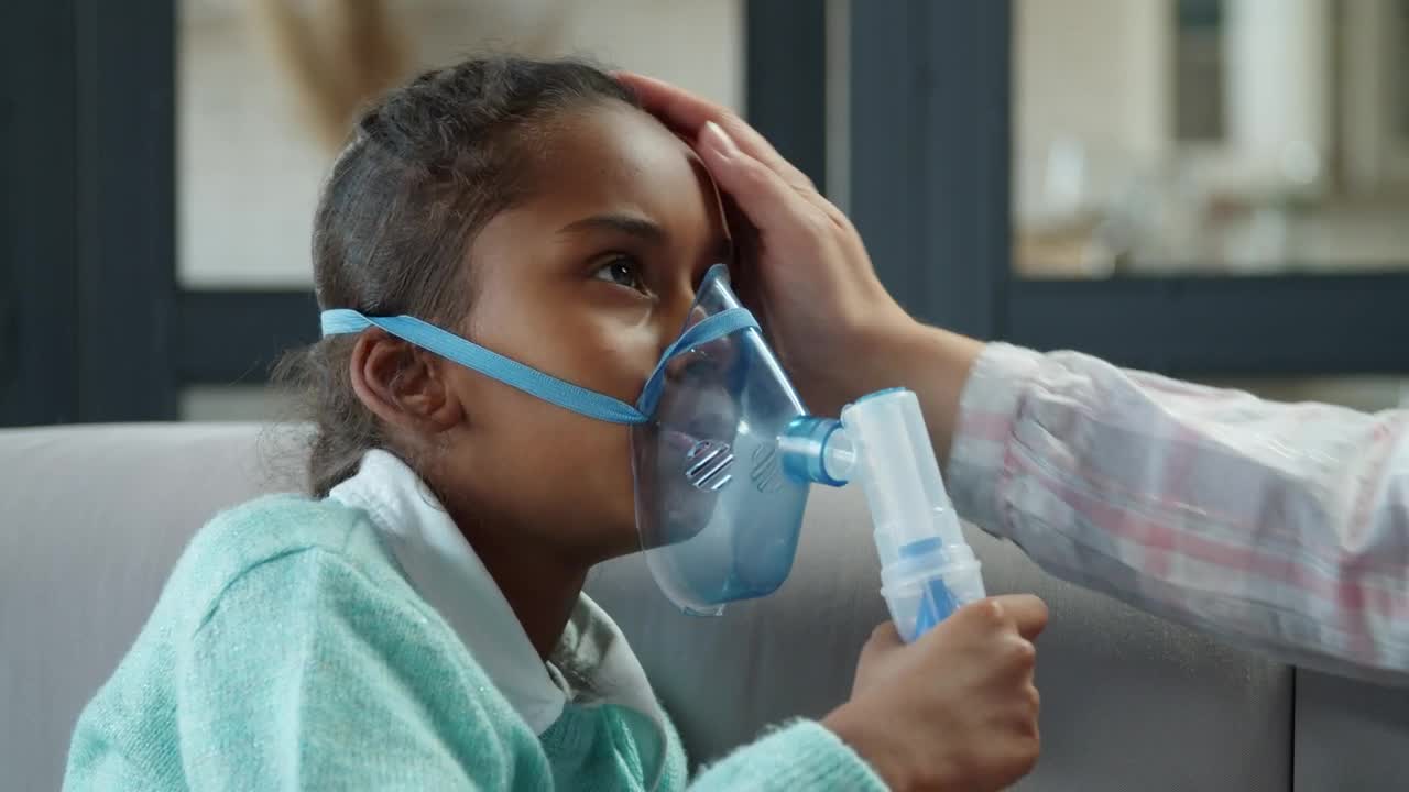 Stock Video Little Girl Breathing From A Nebulizer Animated Wallpaper - Free Download