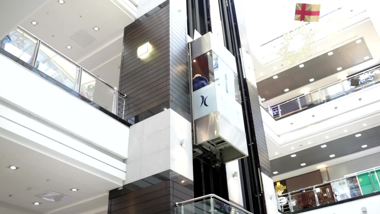 Stock Video Glass Elevator Inside A Shopping Centre Live Wallpaper For PC - Free Download