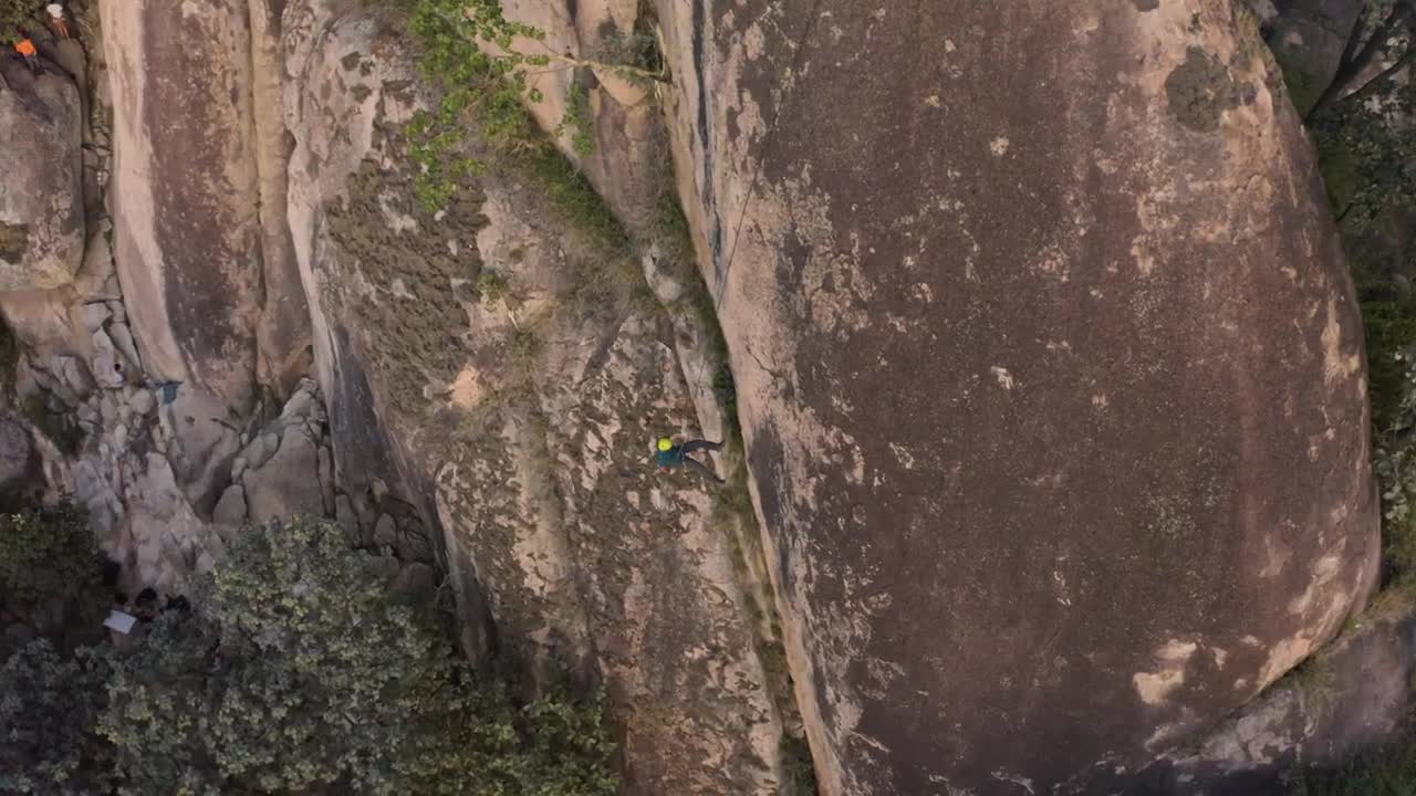 Stock Video Mountaineer Descending A Huge Mountain Seen From The Air Live Wallpaper - Free Download