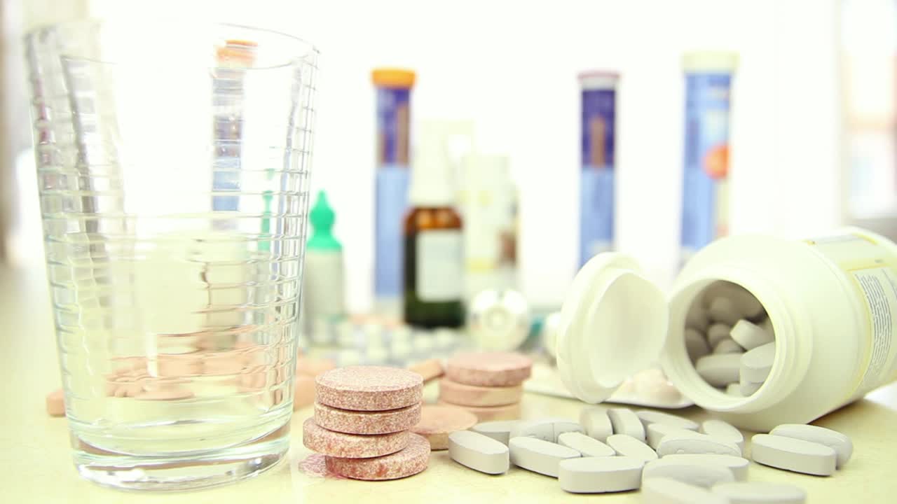 Stock Video Filling A Glass Surrounded By Many Drugs Live Wallpaper For PC - Free Download
