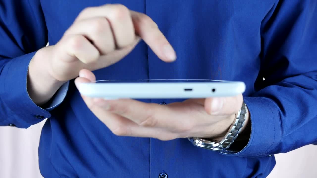 Stock Video Man Typing On A Small Table Animated Wallpaper - Free Download