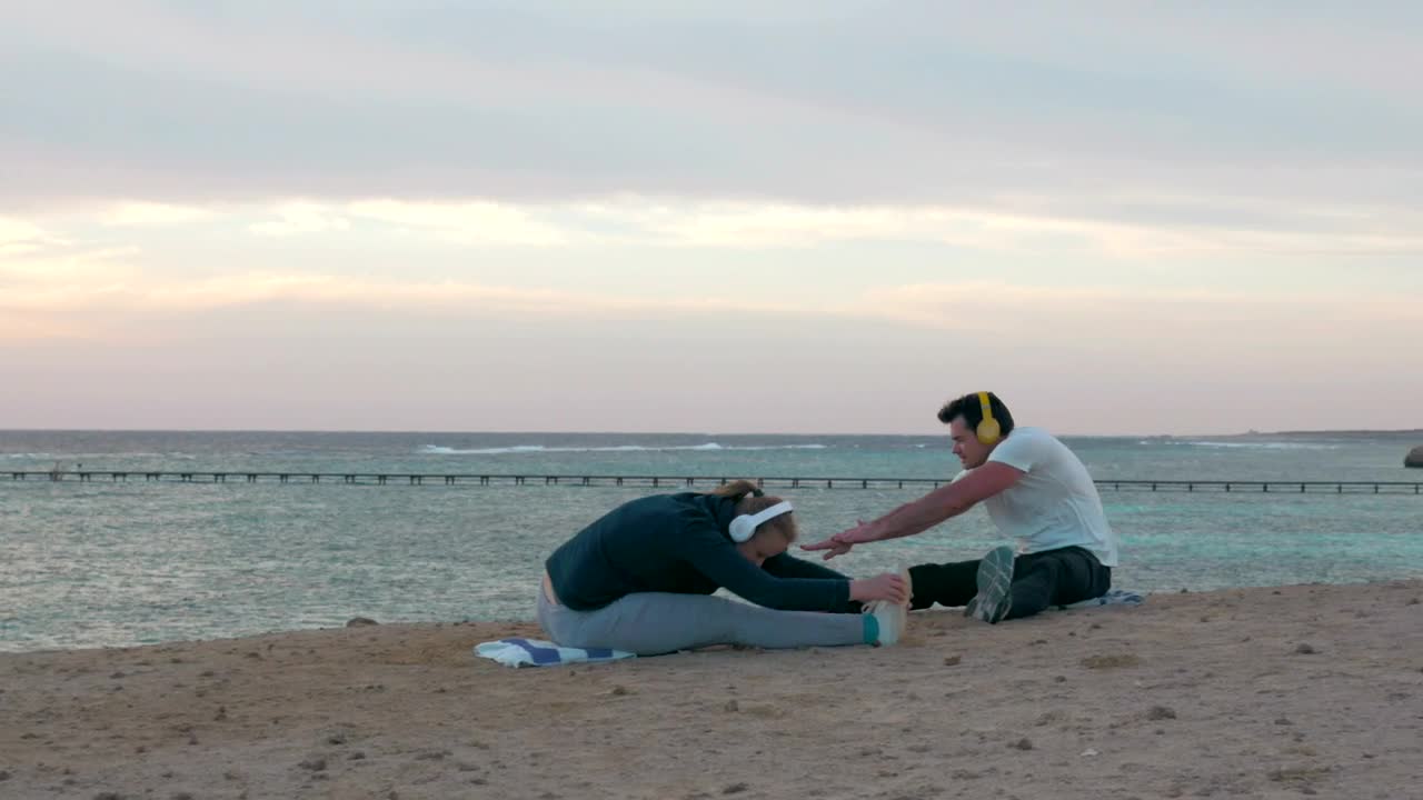 Free Video Stock Stretching Before Going For A Run On The Beach Live Wallpaper - Free Download