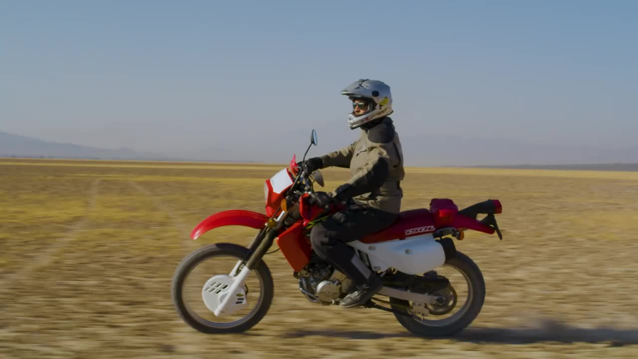 Free Stock Video Side Shot Of A Biker In The Desert Live Wallpaper - Free Download