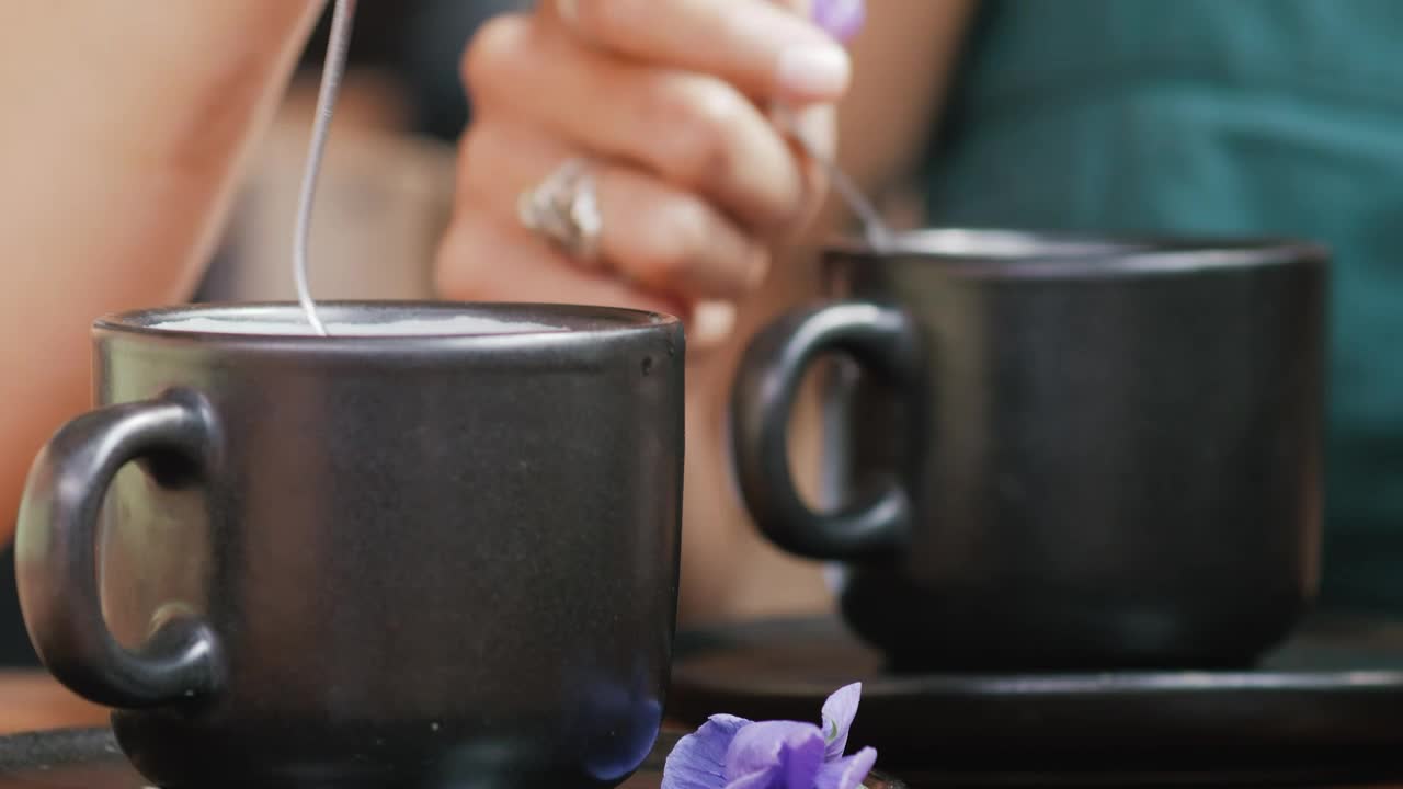 Free Stock Video Two People Moving Coffee In Cup With A Spoon Live Wallpaper - Free Download
