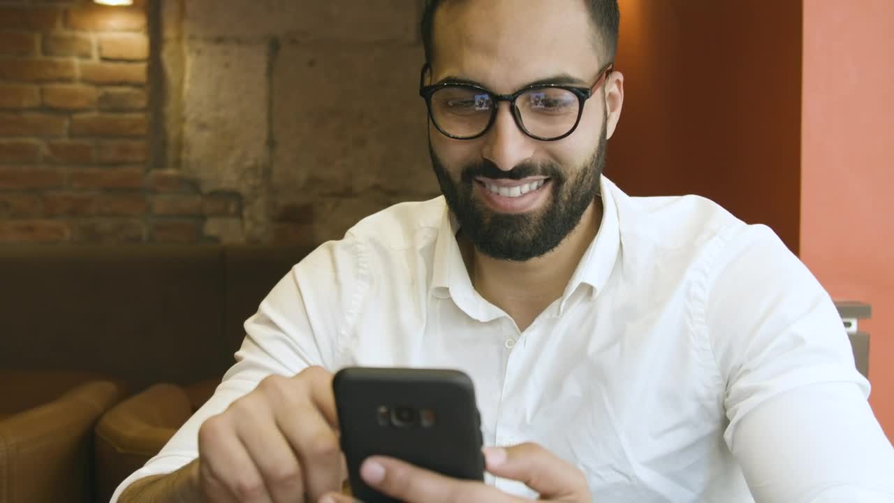Stock Video Man Using Mobile App Reflected In Glasse Animated Wallpaper - Free Download