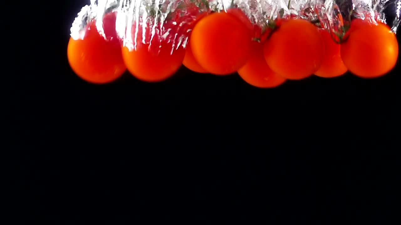 Free Video Stock tomatoes falling through water black background Live Wallpaper - Free Download