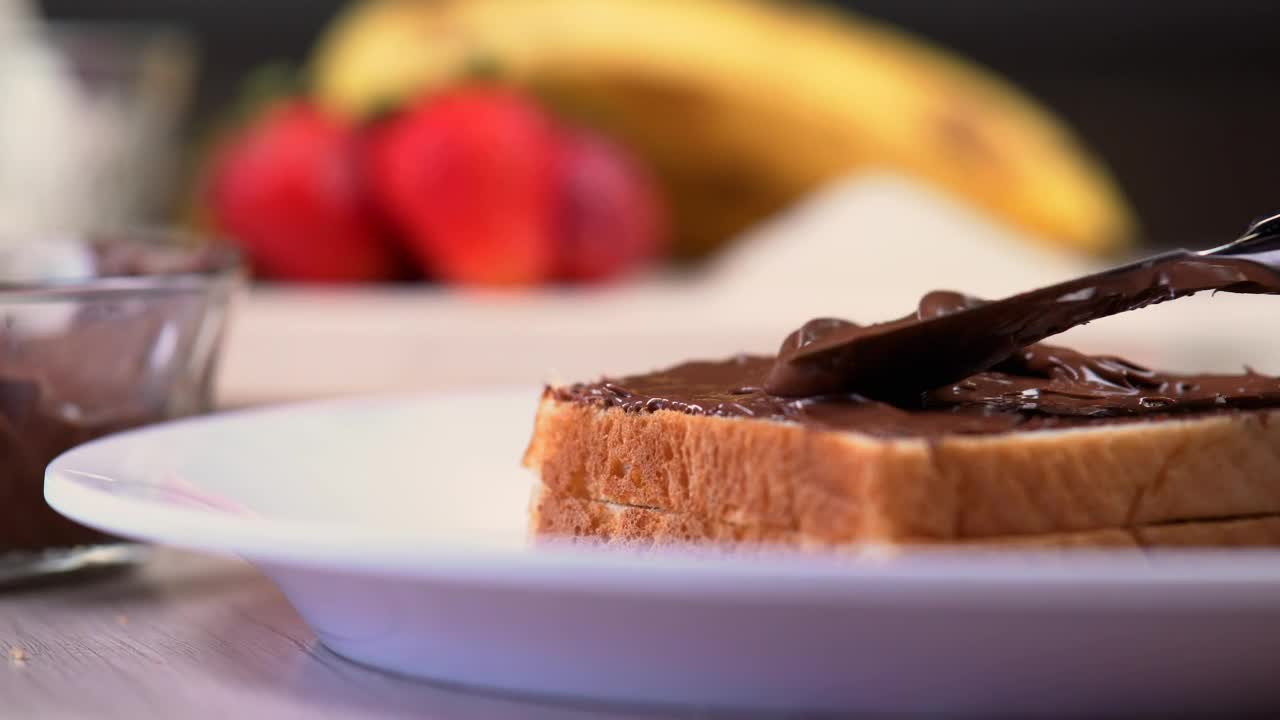 Video Stock Chocolate Or Hazelnut Cream On White Bread Live Wallpaper For PC - Free Download