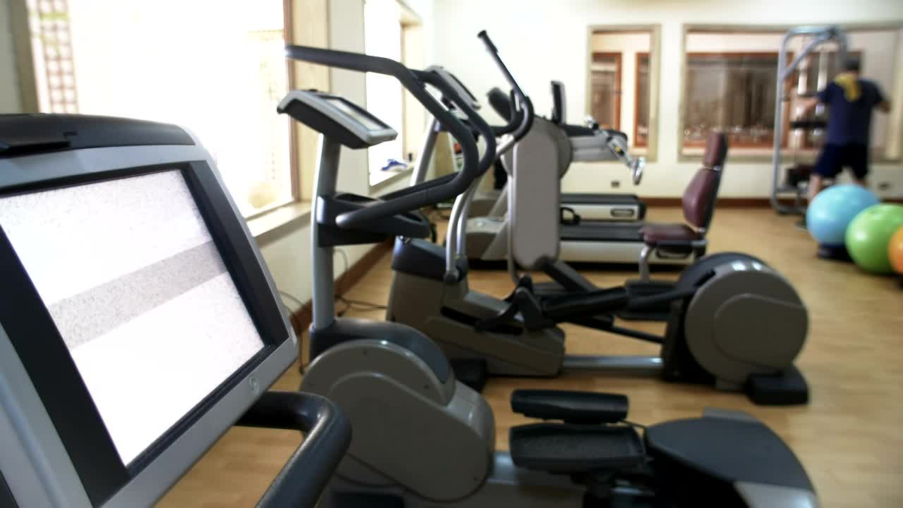 Stock Video Fitness Machines With A Single Man Working Out Live Wallpaper For PC - Free Download