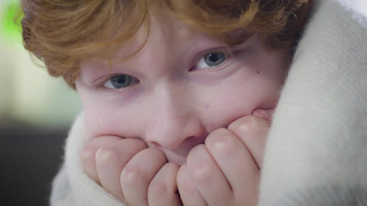 Video Stock Closeup Of Fearful Little Boy Wrapped In Blanket Live Wallpaper For PC - Free Download