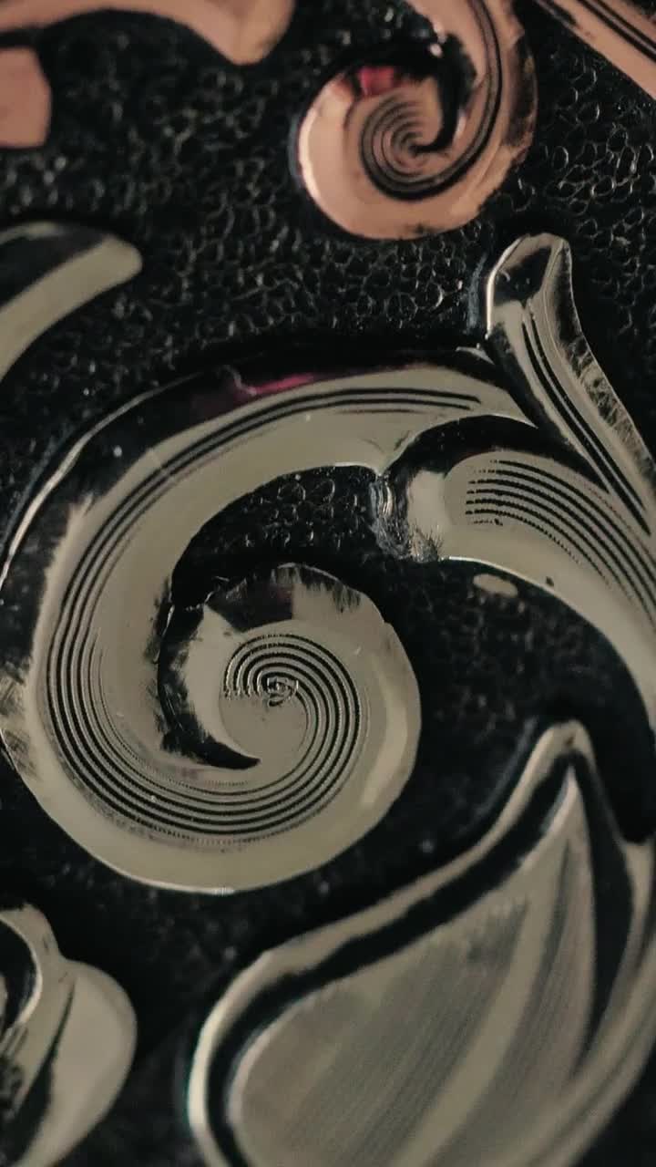 Stock Video Metal Surface Engraved With Ornament Animated Wallpaper - Free Download