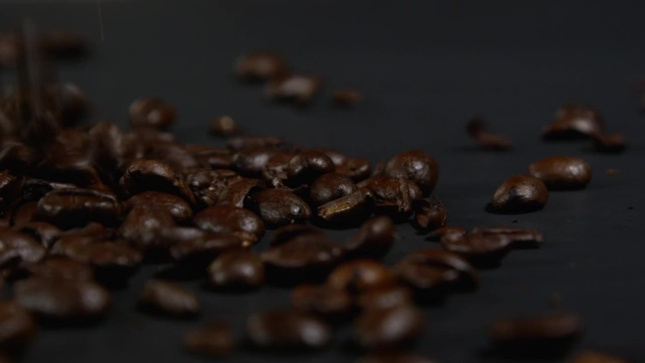 Stock Video Coffee Beans Falling Onto A Dark Cloth Live Wallpaper For PC - Free Download