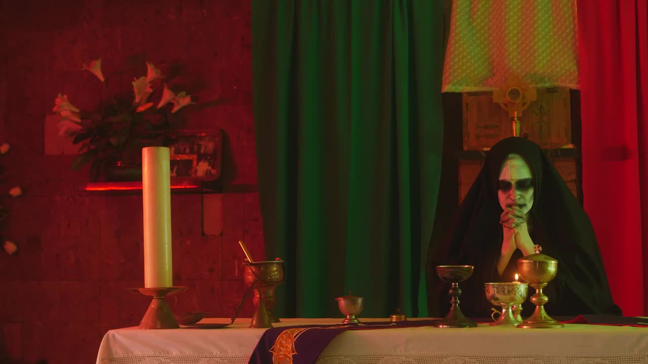 Free Video Stock terrifying ghost nun praying in a temple Live Wallpaper - Free Download