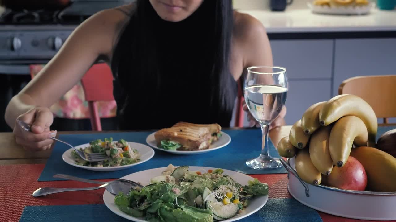 Stock Video Girl Eating Salad In Her Kitchen Dining Room Live Wallpaper For PC - Free Download
