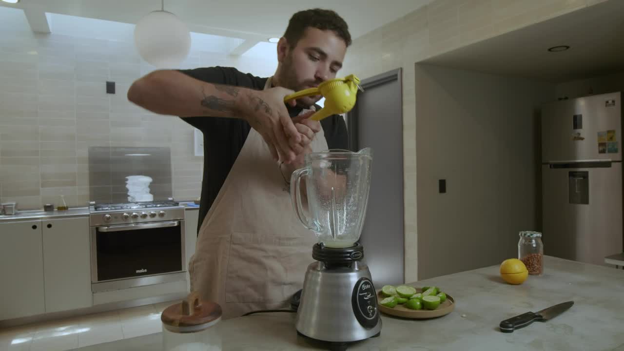 Stock Video Cook Adding Ingredients In A Blender Live Wallpaper For PC - Free Download
