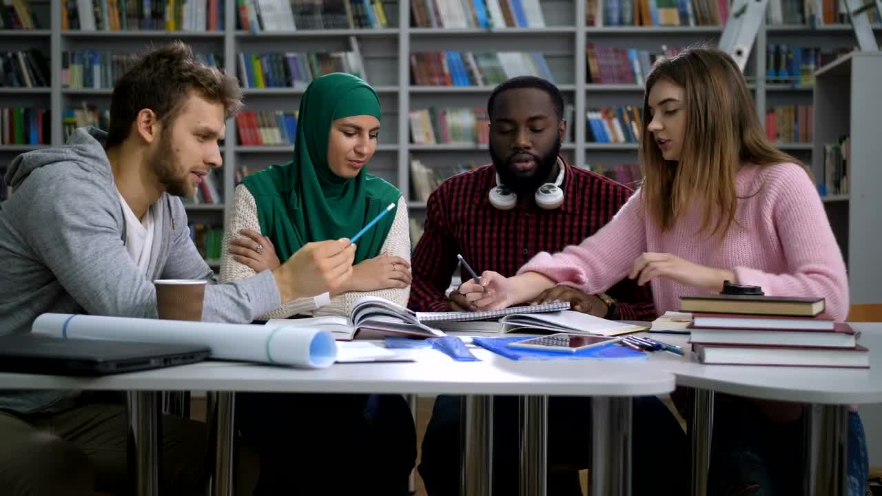 Free Video Stock Students Discussing Their Project Live Wallpaper - Free Download