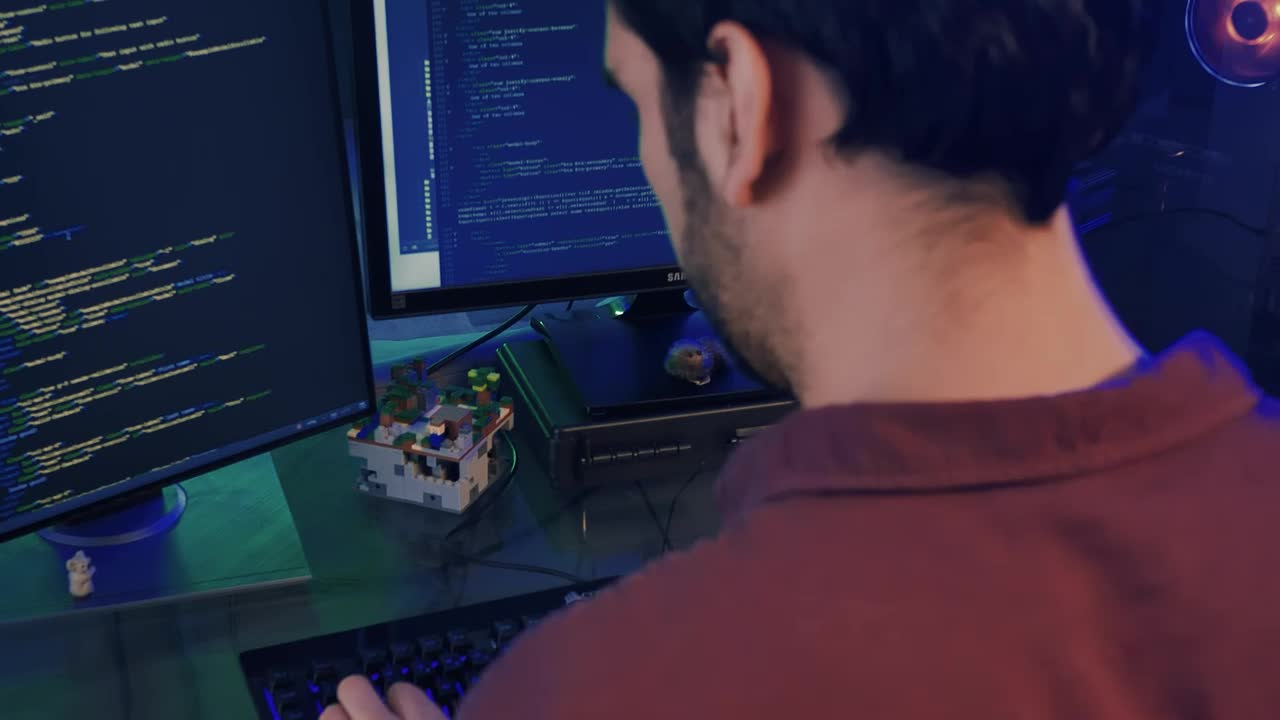 Stock Video Experienced Programmer Working On A Computer Live Wallpaper For PC - Free Download