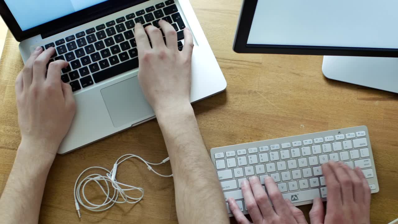 Stock Video Hands Working On Different Keyboards On A Desk Animated Wallpaper - Free Download