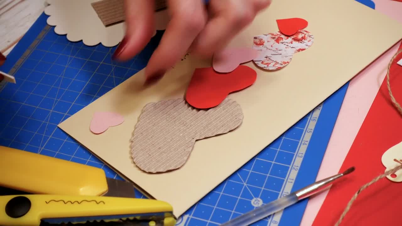 Stock Video Doing A Valentines Greeting Card With Paper Cuts Live Wallpaper For PC - Free Download